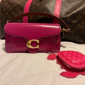 Coach Tabby 20 in patent Fuscia with strap.